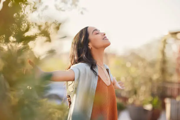 Person practicing a calming breathing exercise
